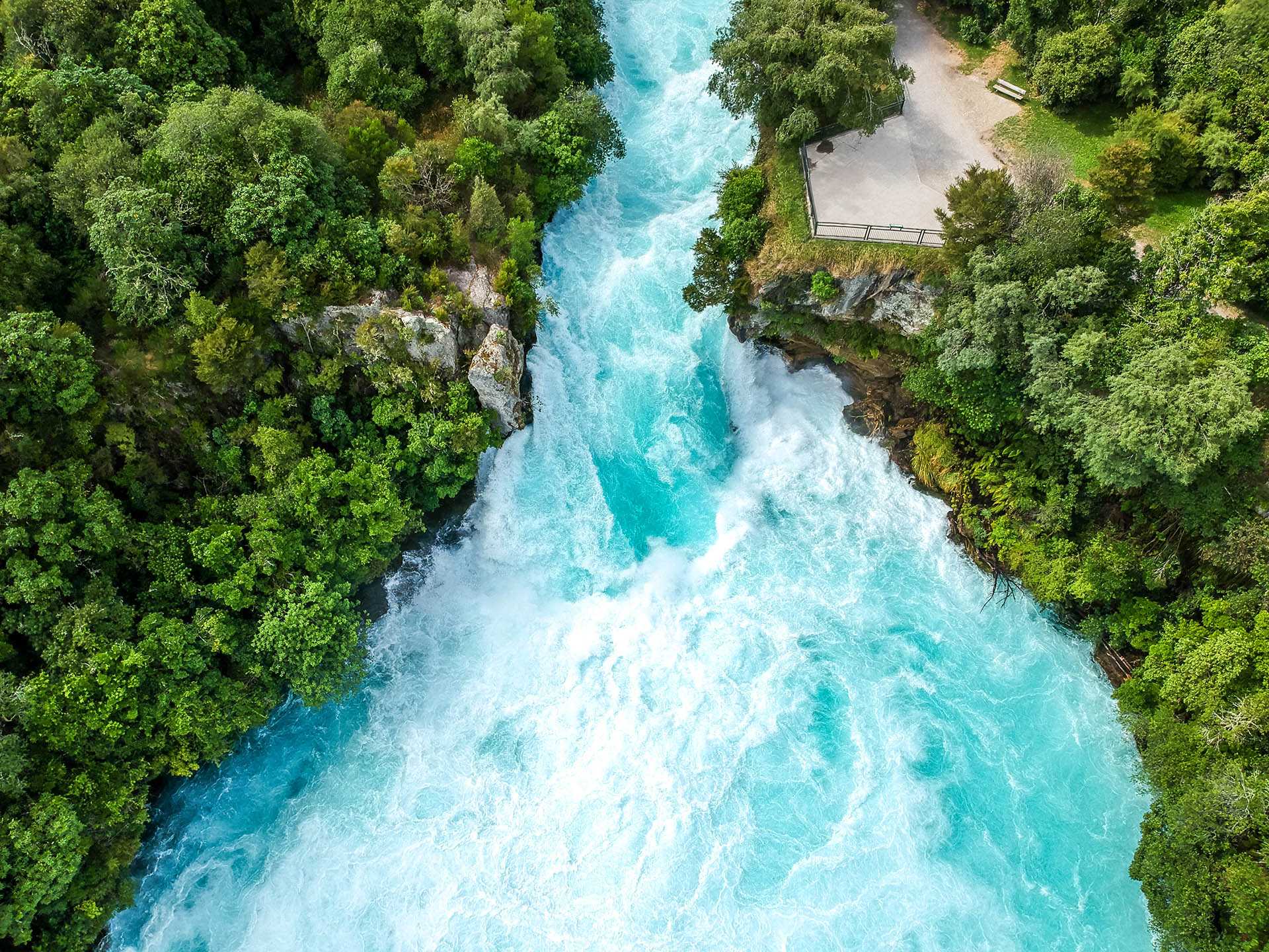 Wild river flowing down waterfall